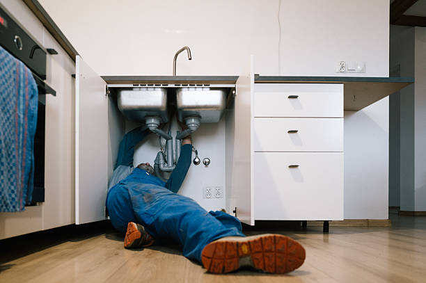 Professional Plumbing technician working in Triangle, VA